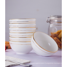 Super white porcelain rice bowls with gold rim.